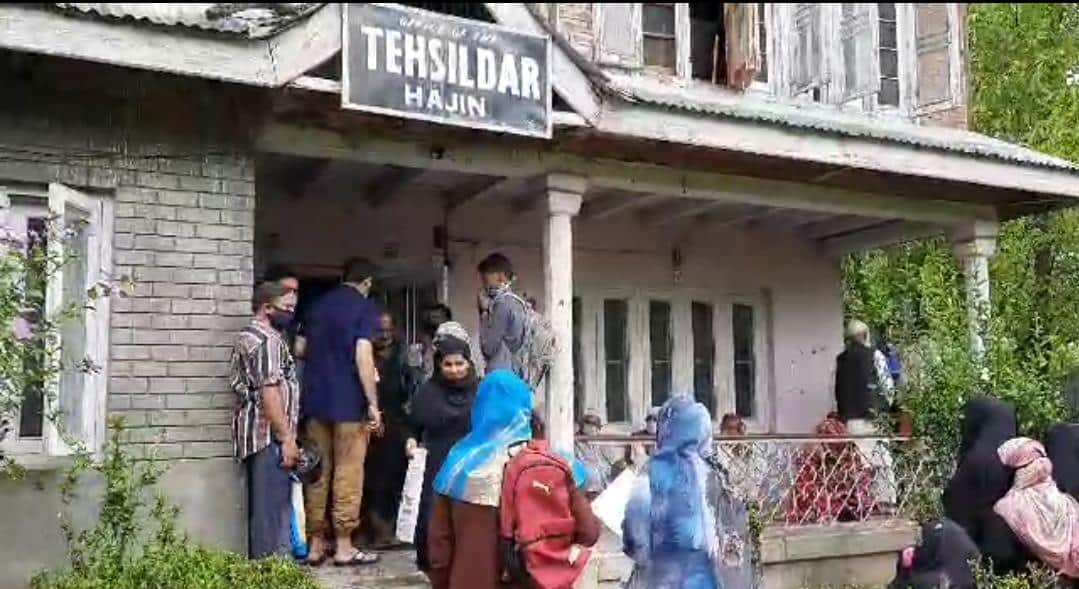 Social distancing goes for a toss at Tehsil Office Hajin