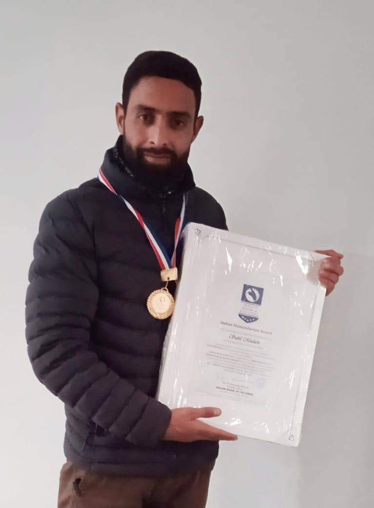 ‘Indian Book of Records’ honours Shopian Youth with“Indian Humanitarian Award” and a Medal of honour.