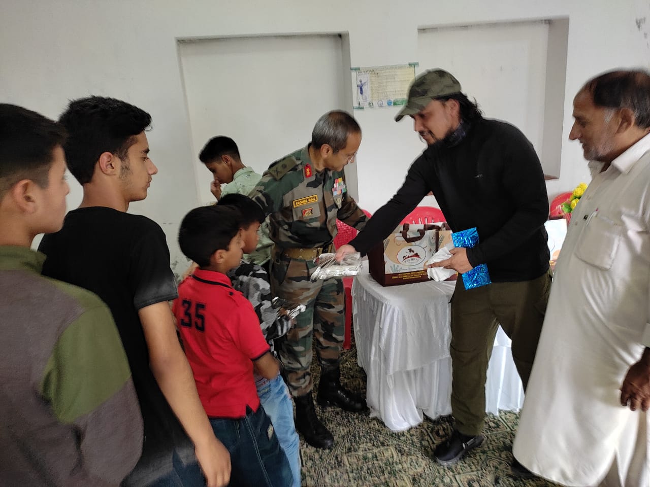 GOC Victor Force distribute  books, clothes Food items among Orphans in Pulwama