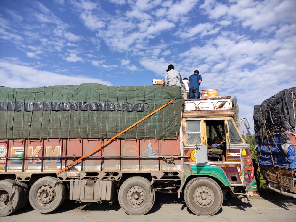 Massive efforts underway to clear fruit—laden trucks on highway