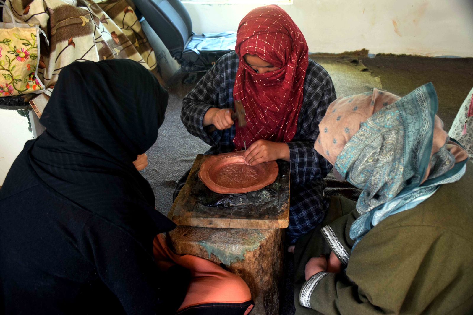 Maiden women group from Budgam gets trained in copper craft