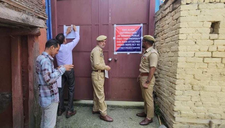 In a first, Police attaches property of drug peddler in Sopore town