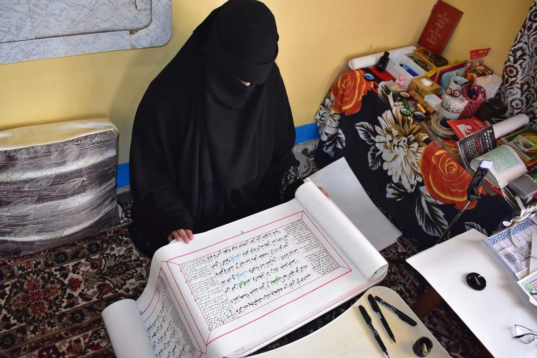 Kashmir Calligrapher sets record, writes Surah Yusuf on 15 metres scroll