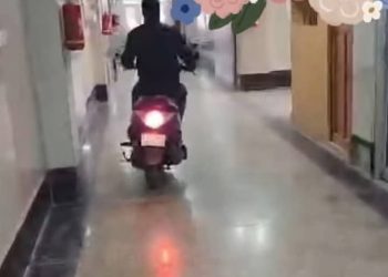 Negligence at CHC Chattergam: Employee Caught Riding Scooty in Hospital Corridors