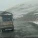 Pir Panjal Receives Light Snowfall, Traffic Slows Along Mughal Road